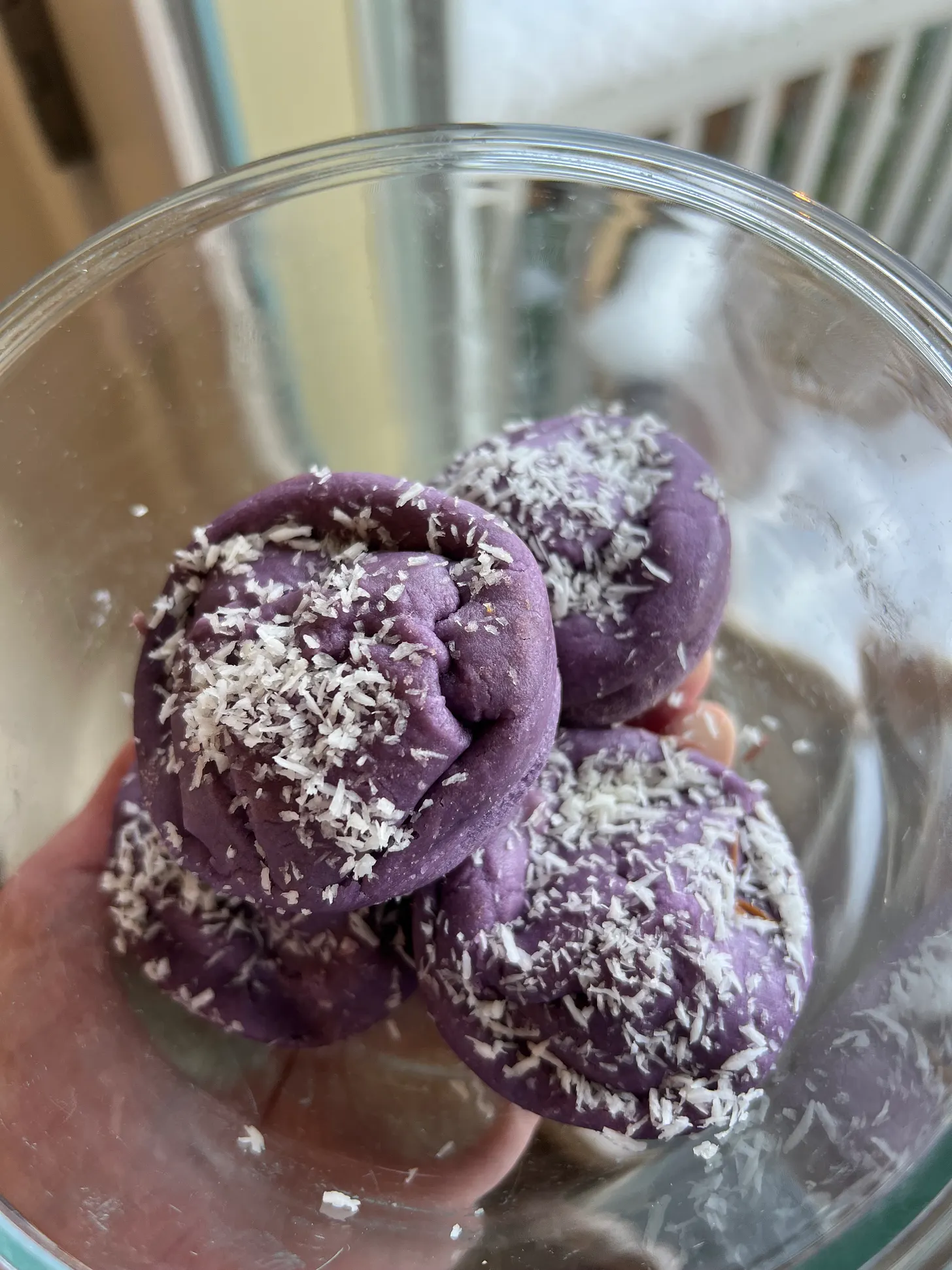 Ube butter mochi bites topped with coconut